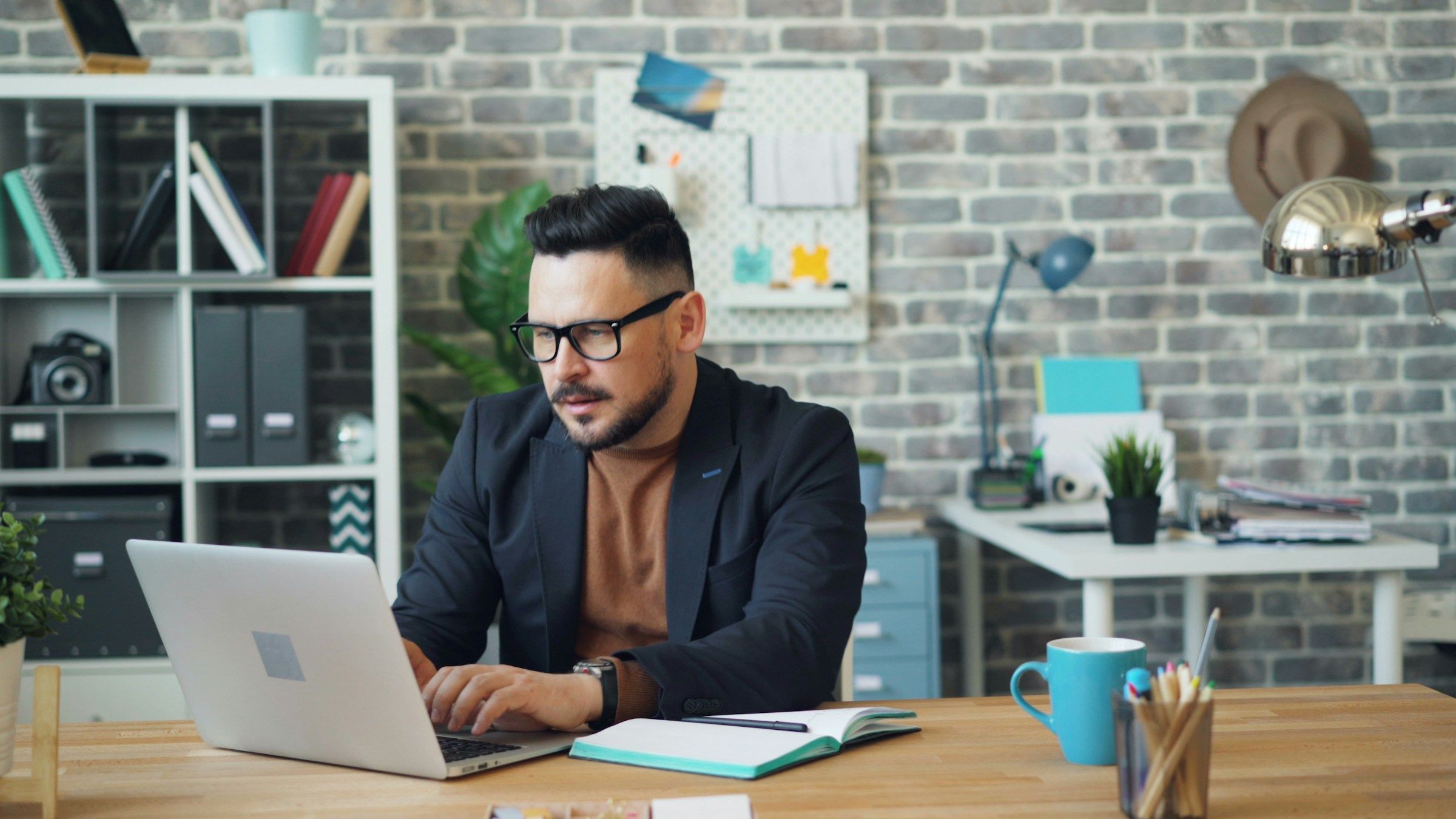 man on a laptop - Best Text-to-Video AI Generator